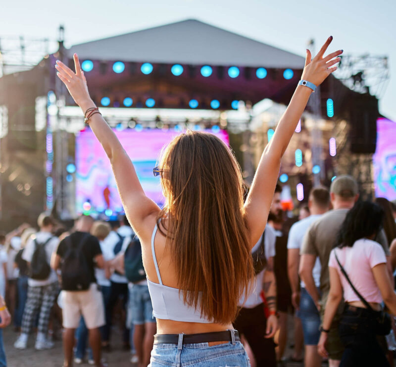 Young girl at a concert where SwiftFoto's multimedia photo printer would be used.